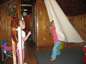 The attic. Here is my daughter and her friend playing in the pirate ship playroom I made for her (complete with canvas sail and freestanding ship's wheel). This is the room my brother slept in. Once.